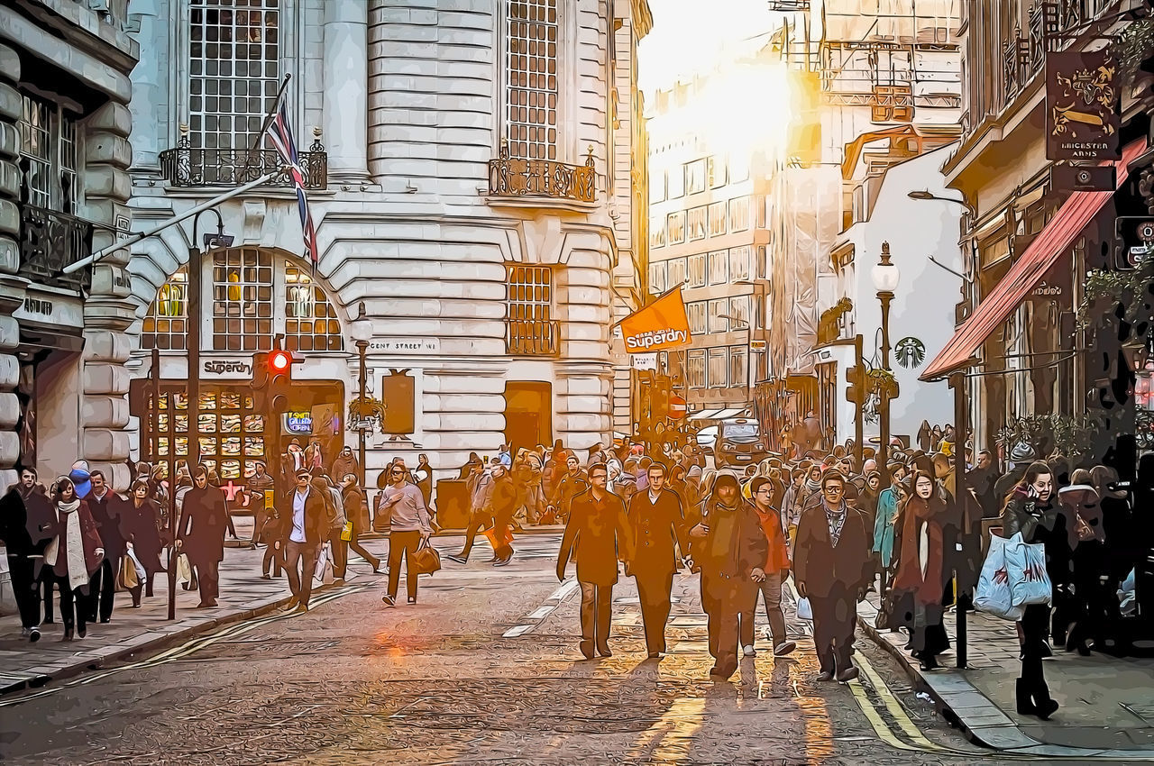 PEOPLE WALKING ON STREET IN CITY