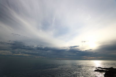 Scenic view of sea against sky at sunset