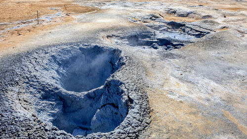High angle view of geothermal mud pits on land