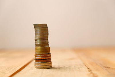 Close-up of coins on table