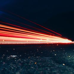 Surface level of light trails on road