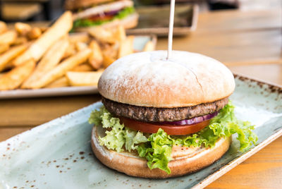 Close-up of served hamburger