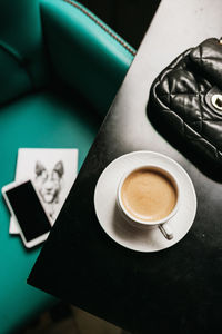 High angle view of coffee on table