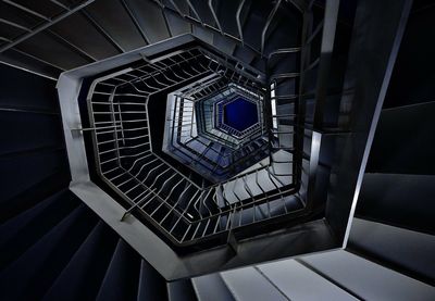 Directly below shot of spiral staircase in building