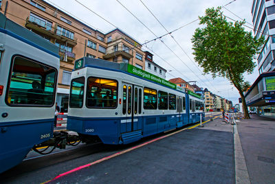 Train on railroad track in city