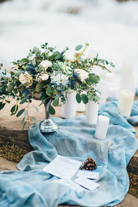 White flower vase on table