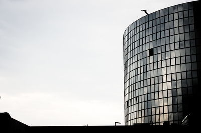 Low angle view of modern building against sky