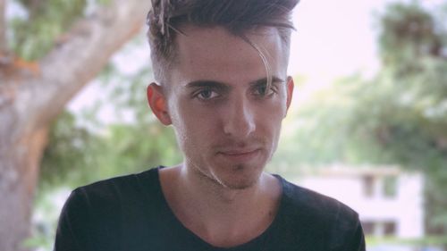 Close-up portrait of mid adult man