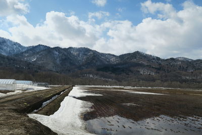 Scenic view of mountains against sky during winter