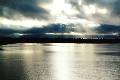 Scenic view of sea against cloudy sky