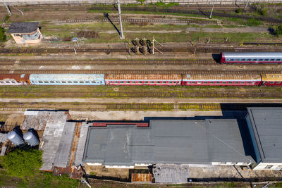 High angle view of railroad tracks on field