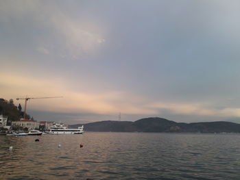 Scenic view of sea against sky at sunset