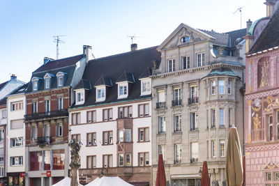 View of residential buildings against clear sky