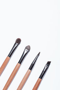 High angle view of objects against white background