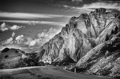 Scenic view of mountains against cloudy sky