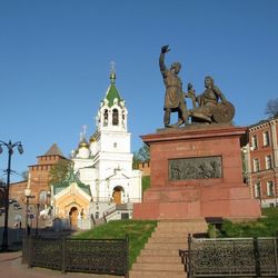 Low angle view of statue against clear blue sky