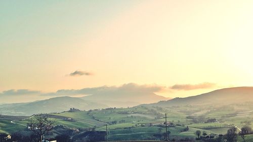 Scenic view of landscape against sky during sunset