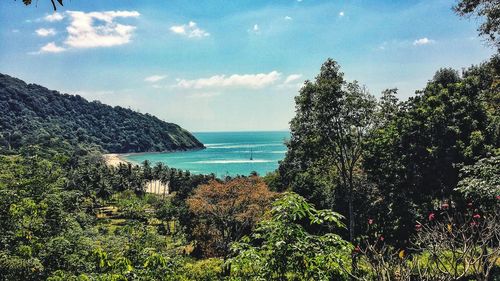 Scenic view of sea against cloudy sky