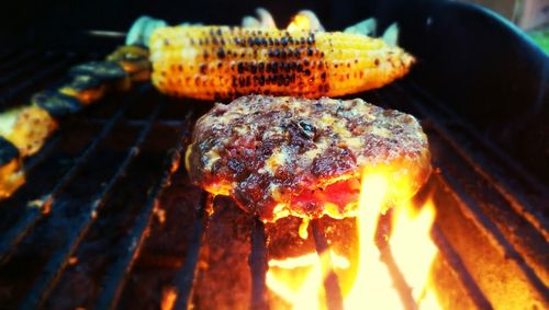 Close-up of meat on barbecue grill