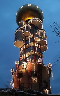 Low angle view of sculpture against clear blue sky