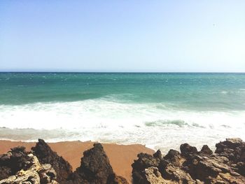 Scenic view of sea against clear sky