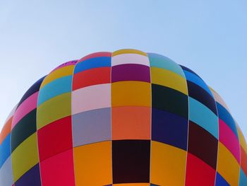 Low angle view of hot air balloon against clear sky