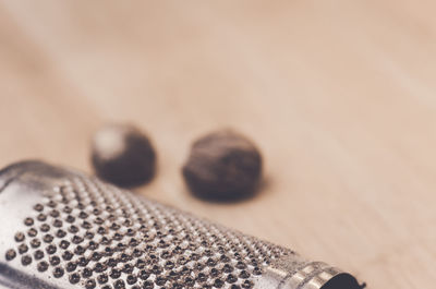 Close up of grater on table