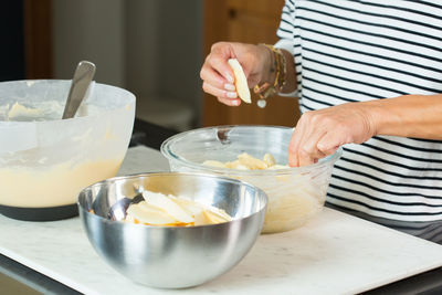 Midsection of woman having breakfast