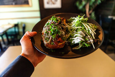 Close-up of hand holding food