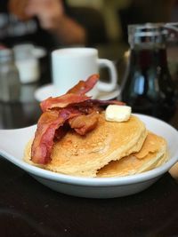 Close-up of breakfast served on table in cafe