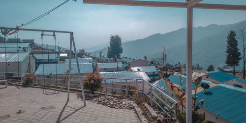 High angle view of buildings against sky during winter