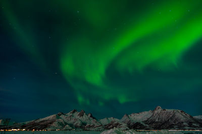 Scenic view of mountain against sky at night