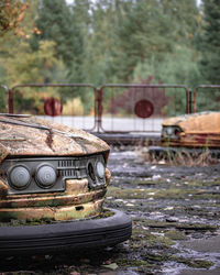 Close-up of rusty abandoned car