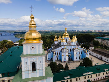 High angle view of buildings in city against sky