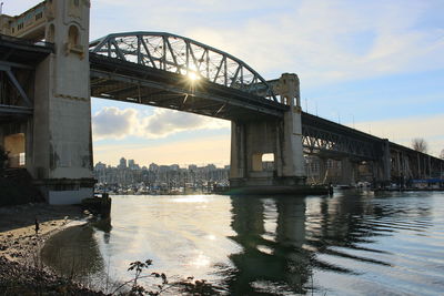 Low angle view of burrard bridge over river 