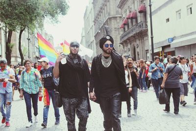 People walking on street in city