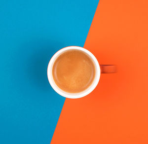 Directly above shot of coffee cup on table