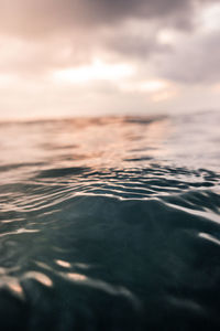 Surface level of swimming pool against sky