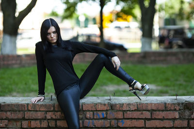Full length portrait of young woman