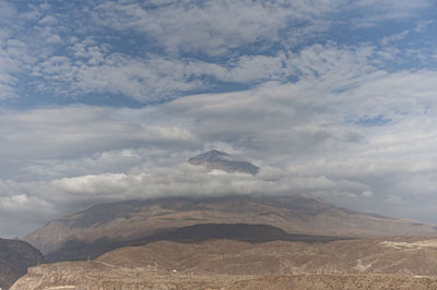 The misti volcano seen in the middle of clouds that surround it in the city of arequipa