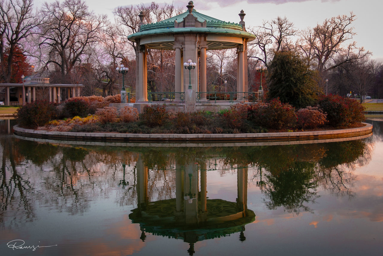 reflection, water, tree, architecture, built structure, lake, gazebo, growth, tranquility, plant, nature, standing water, day, outdoors, sky, no people, tranquil scene, beauty in nature, scenics, idyllic