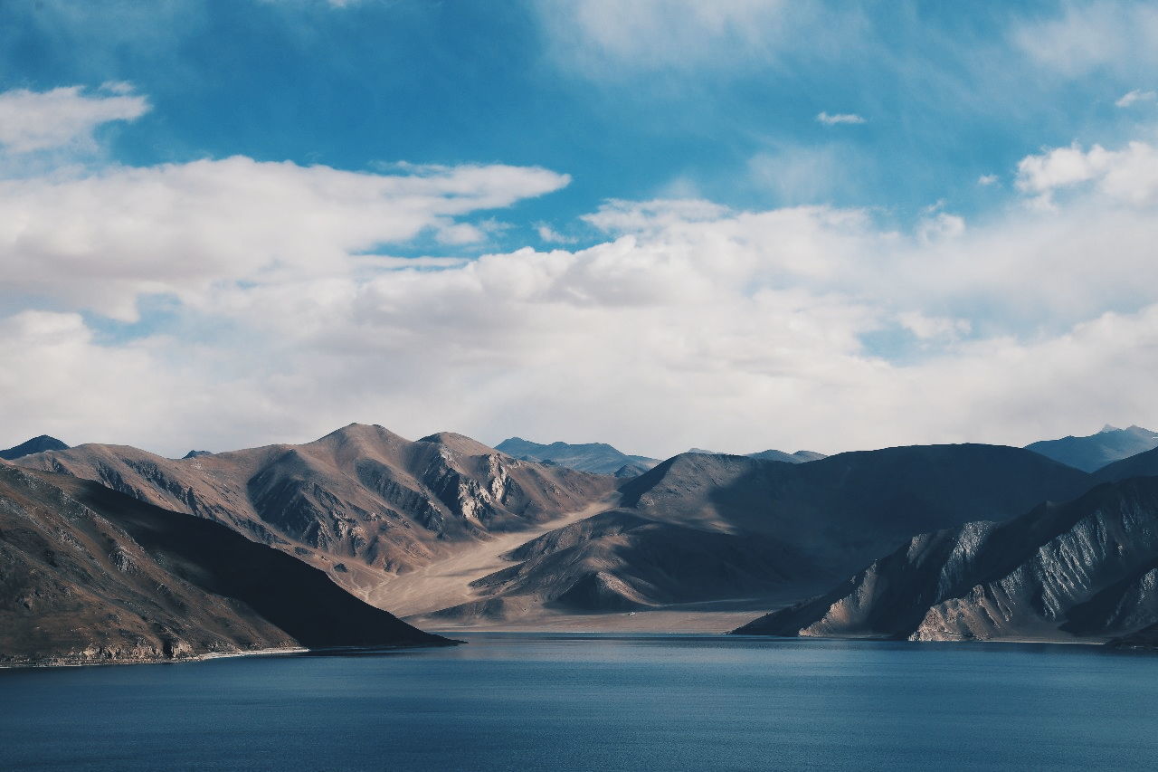 mountain, cloud - sky, water, beauty in nature, sky, scenics - nature, mountain range, tranquil scene, waterfront, tranquility, nature, no people, environment, non-urban scene, day, idyllic, landscape, lake, remote, formation, range