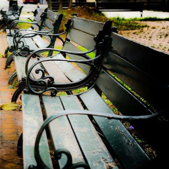 metal, close-up, focus on foreground, metallic, high angle view, railing, sunlight, day, no people, rusty, outdoors, wood - material, selective focus, bicycle, old, absence, empty, shadow, chair, part of