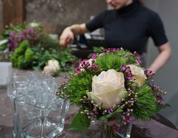 Close-up of hand holding bouquet