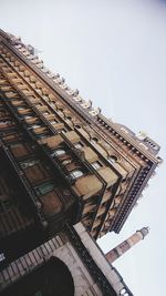 Low angle view of buildings against clear sky