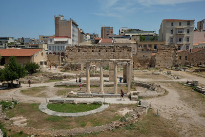 Buildings in city against sky