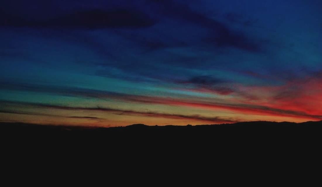 sky, cloud - sky, sunset, scenics - nature, beauty in nature, tranquility, tranquil scene, silhouette, environment, orange color, dramatic sky, nature, landscape, no people, dark, majestic, awe, idyllic, outdoors, romantic sky