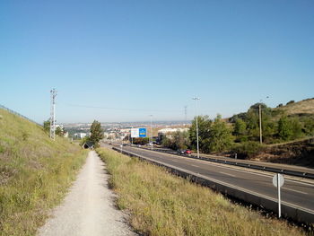 View of road against blue sky