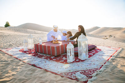 Couple sitting on table