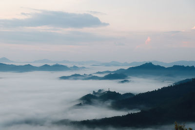 Scenic view of mountains against sky during sunset